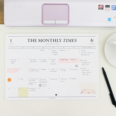 The Monthly Times Desk Planner by Seeso Graphics